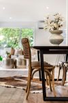 Black Oak Dining table with Brown Oak chairs, Modern white vase Home staging