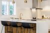 White kitchen with gold hardware kitchen styling